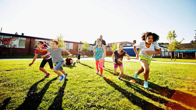 Kids wearing sustainable shoes running back to school