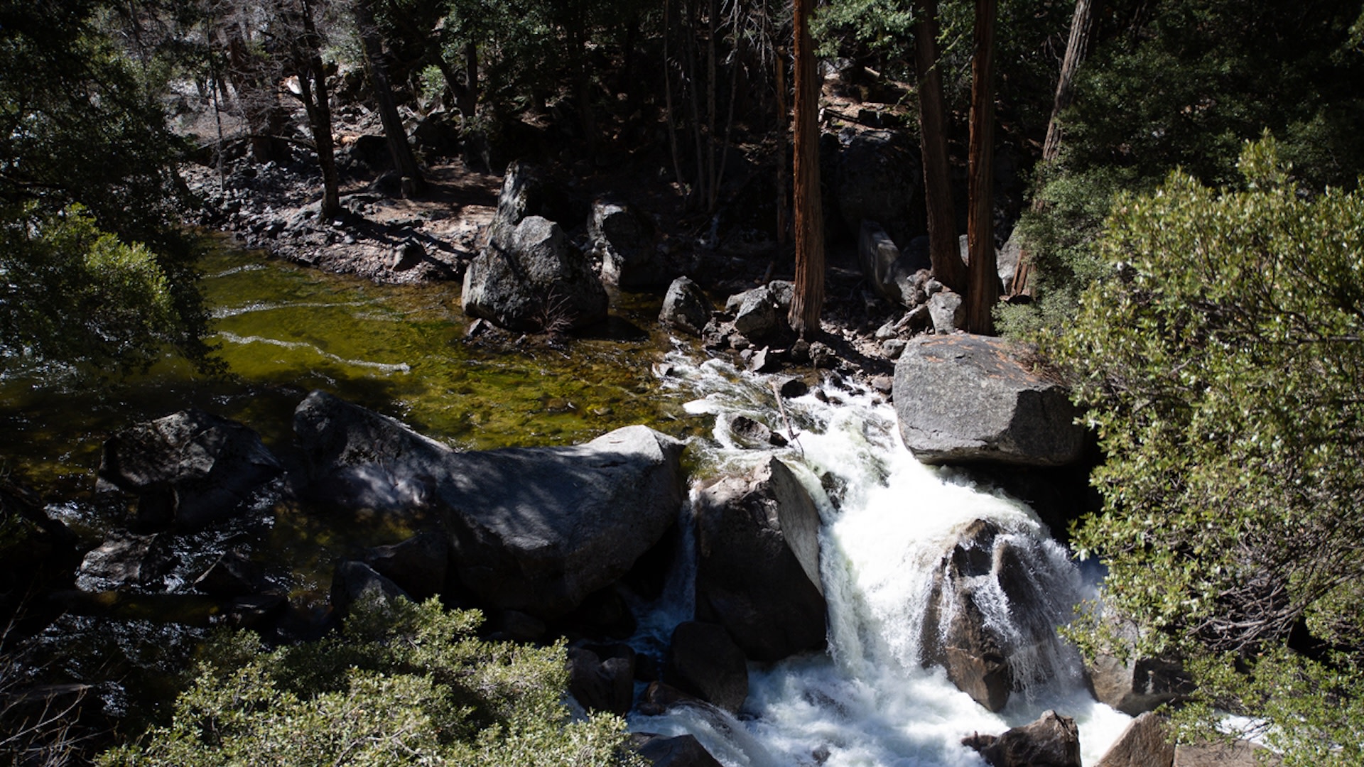 "Both sides of the falls are worn down to dust from people climbing up it."