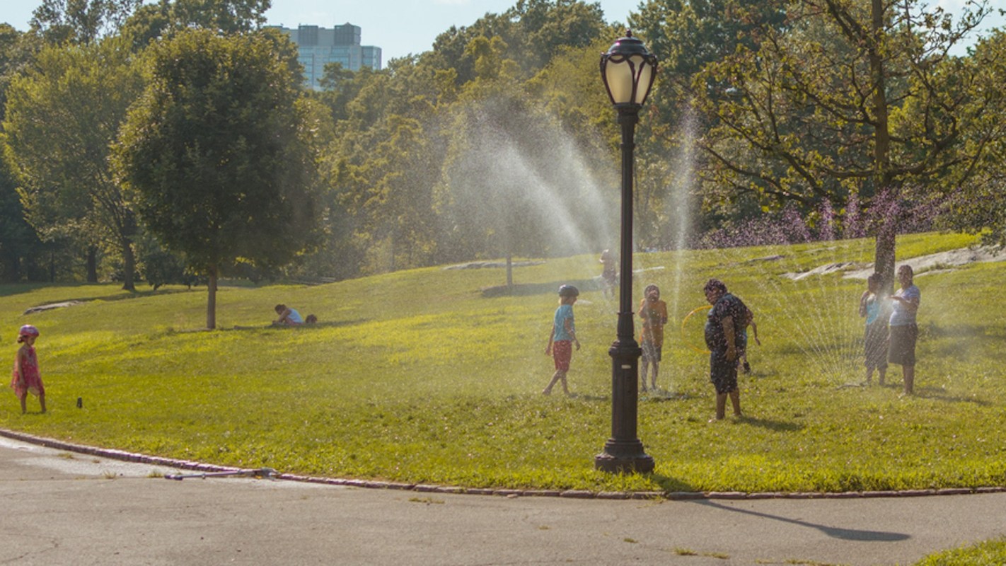 This happens because surfaces like parking lots, sidewalks, streets, and the roofs of buildings retain solar radiation instead of expelling it.