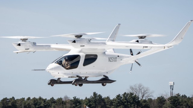 The plane can carry up to five people or 500 pounds of cargo, has a range of 288 miles, and can be recharged in less than an hour.