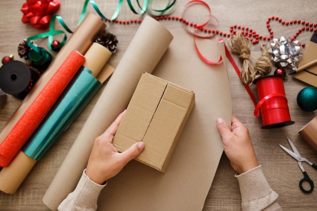 Repurposing old paper, such as newspapers, magazines, old calendars, or sheet music, is a simple way to save money on gift wrap.