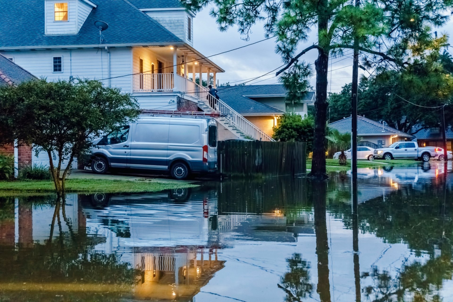 A flooding neighborhood street.