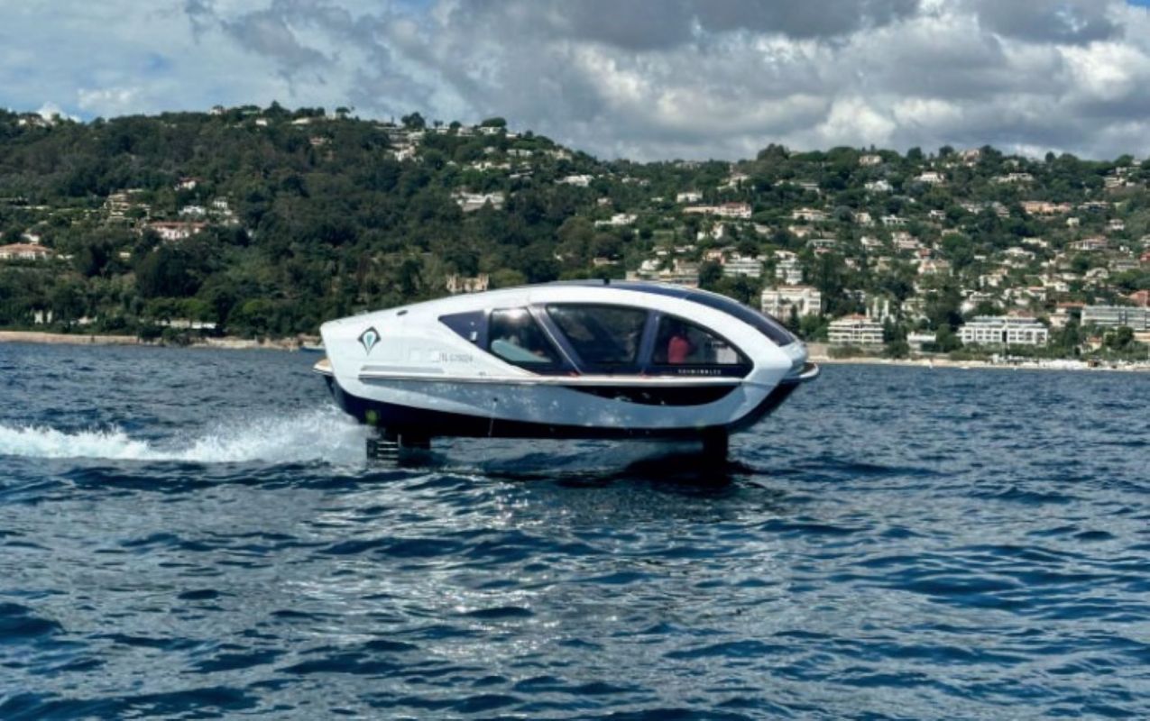 The vessel stays in the water, like conventional boats, at low speeds and taps into its two-propeller electric drive system.