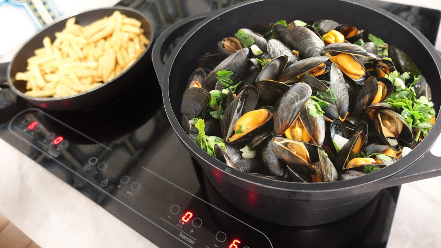 Food cooking on an induction stove.